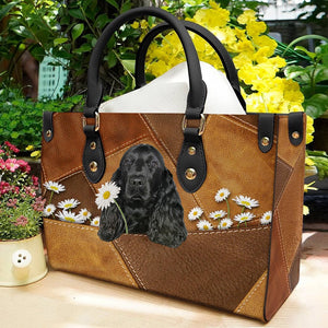 Black Cocker Spaniel Holding Daisy Leather Bag