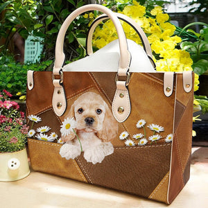 Cocker Spaniel Holding Daisy Leather Bag