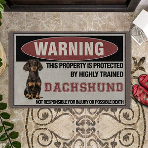 THIS PROPERTY IS PROTECTED BY HIGHLY TRAINED Dachshund Doormat