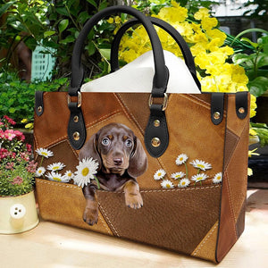 Dachshund 3 Holding Daisy Leather Bag