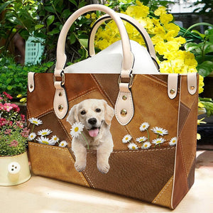 Golden Retriever Holding Daisy Leather Bag