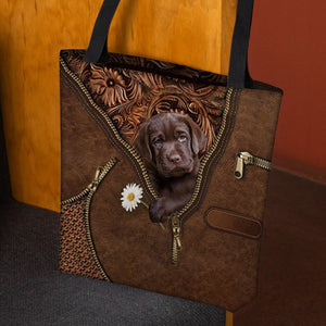 Chocolate Labrador Retriever Holding Daisy Tote Bag