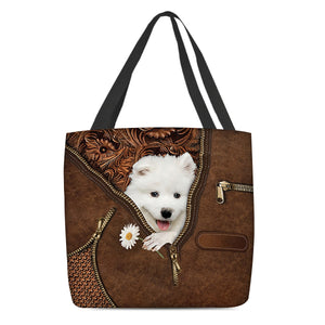 Samoyed Holding Daisy Tote Bag