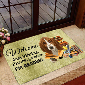 Basset HoundDoormat-Welcome.Just kidding. Please, go home. I'm Reading.