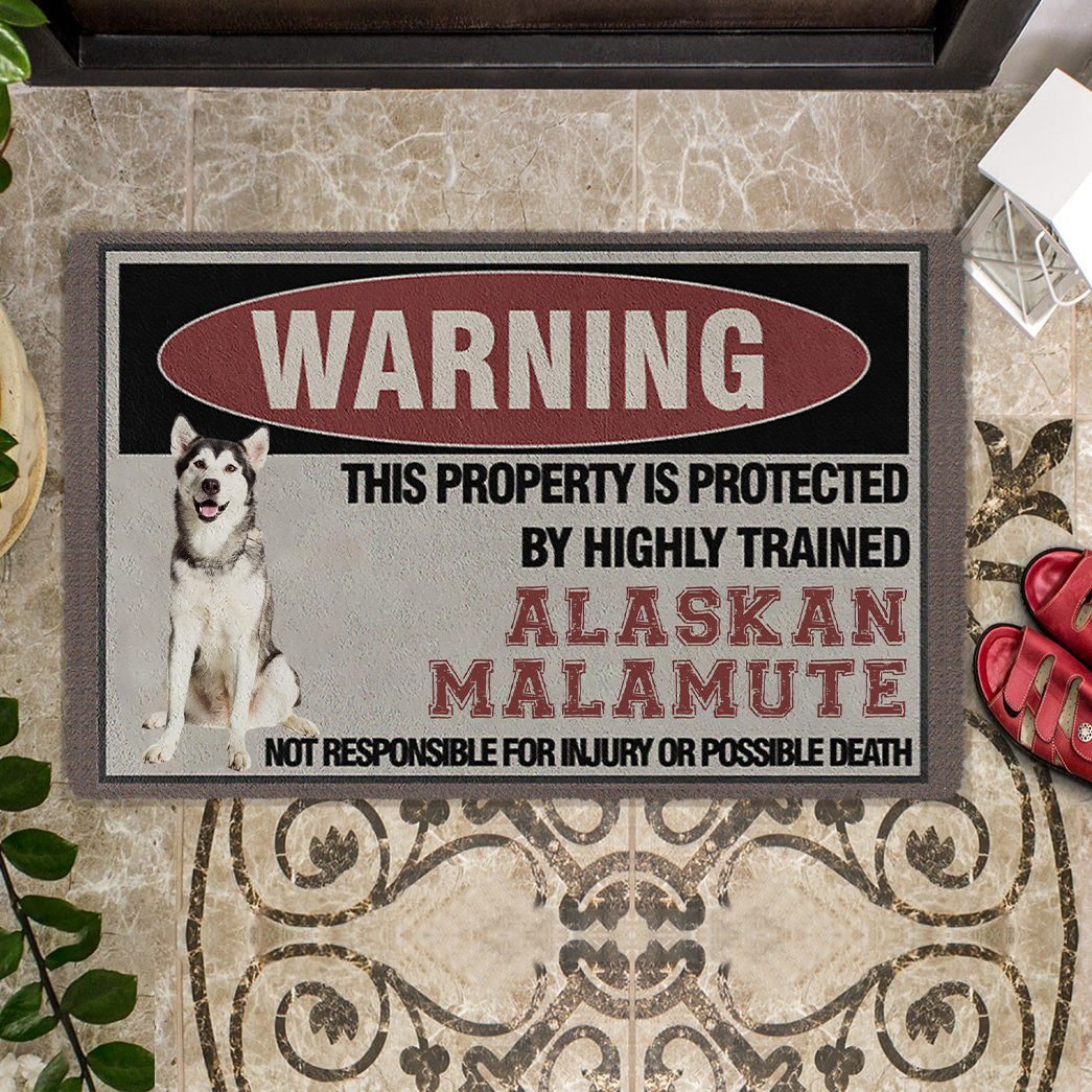 THIS PROPERTY IS PROTECTED BY HIGHLY TRAINED Alaskan Malamute Doormat