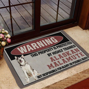 THIS PROPERTY IS PROTECTED BY HIGHLY TRAINED Alaskan Malamute Doormat