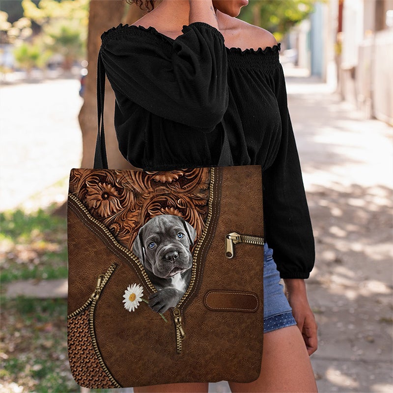 Cane Corso Holding Daisy Tote Bag