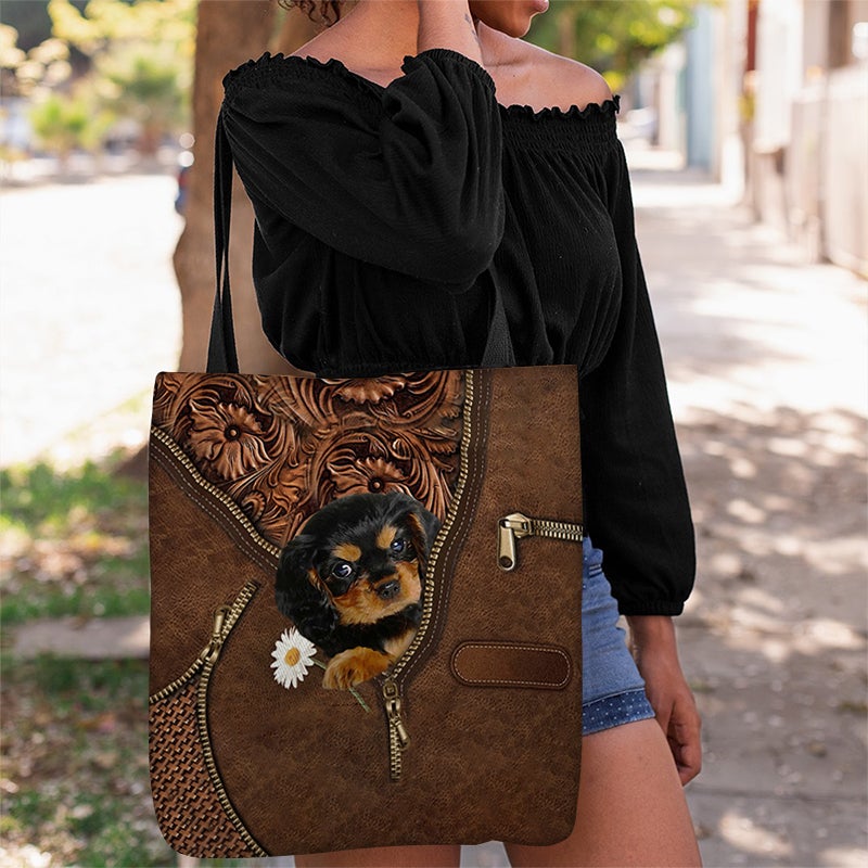 Cavalier King Charles Spaniel Holding Daisy Tote Bag
