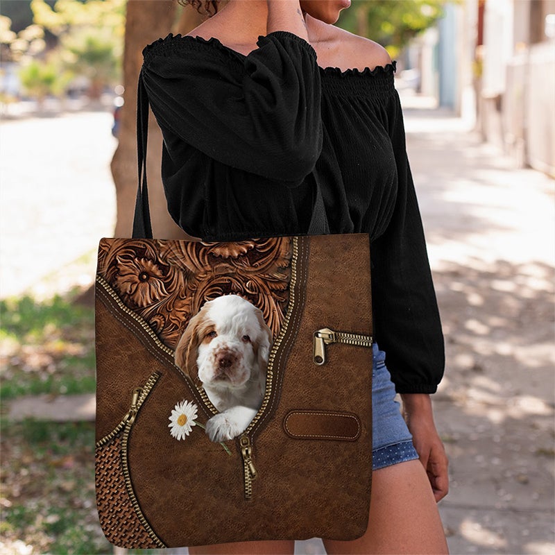 Clumber Spaniel Holding Daisy Tote Bag