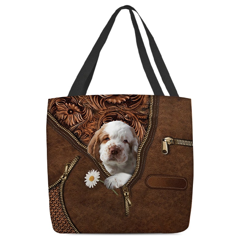 Clumber Spaniel Holding Daisy Tote Bag