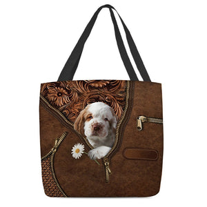 Clumber Spaniel Holding Daisy Tote Bag
