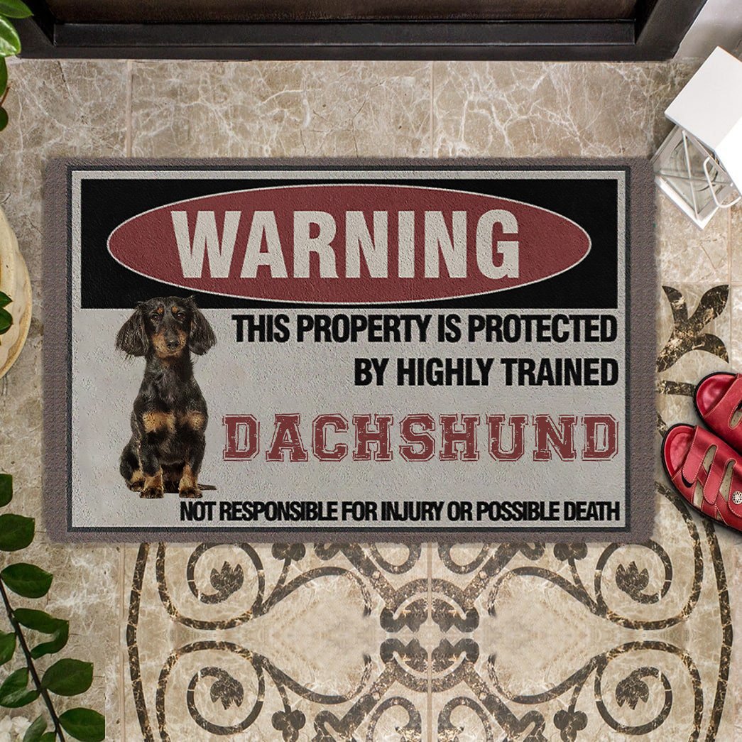 THIS PROPERTY IS PROTECTED BY HIGHLY TRAINED Dachshund Doormat