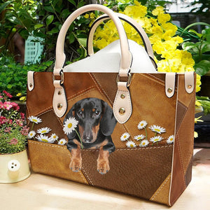 Dachshund Holding Daisy Leather Bag