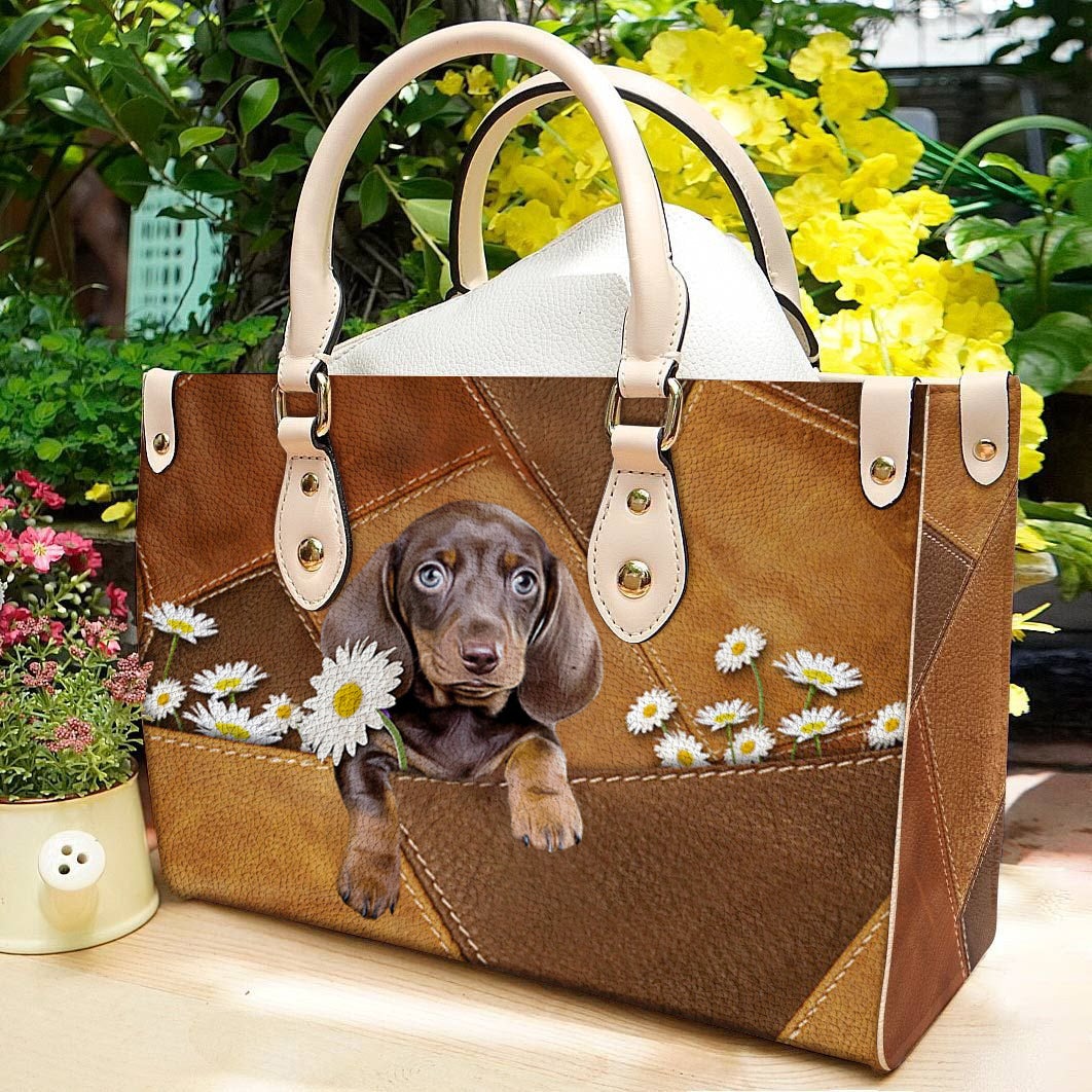 Dachshund 3 Holding Daisy Leather Bag