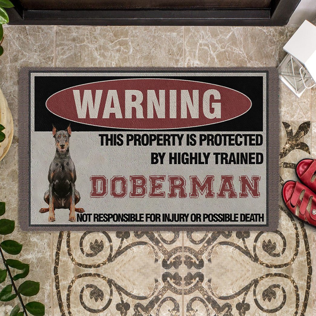 THIS PROPERTY IS PROTECTED BY HIGHLY TRAINED Doberman Doormat
