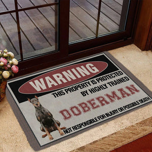 THIS PROPERTY IS PROTECTED BY HIGHLY TRAINED Doberman Doormat