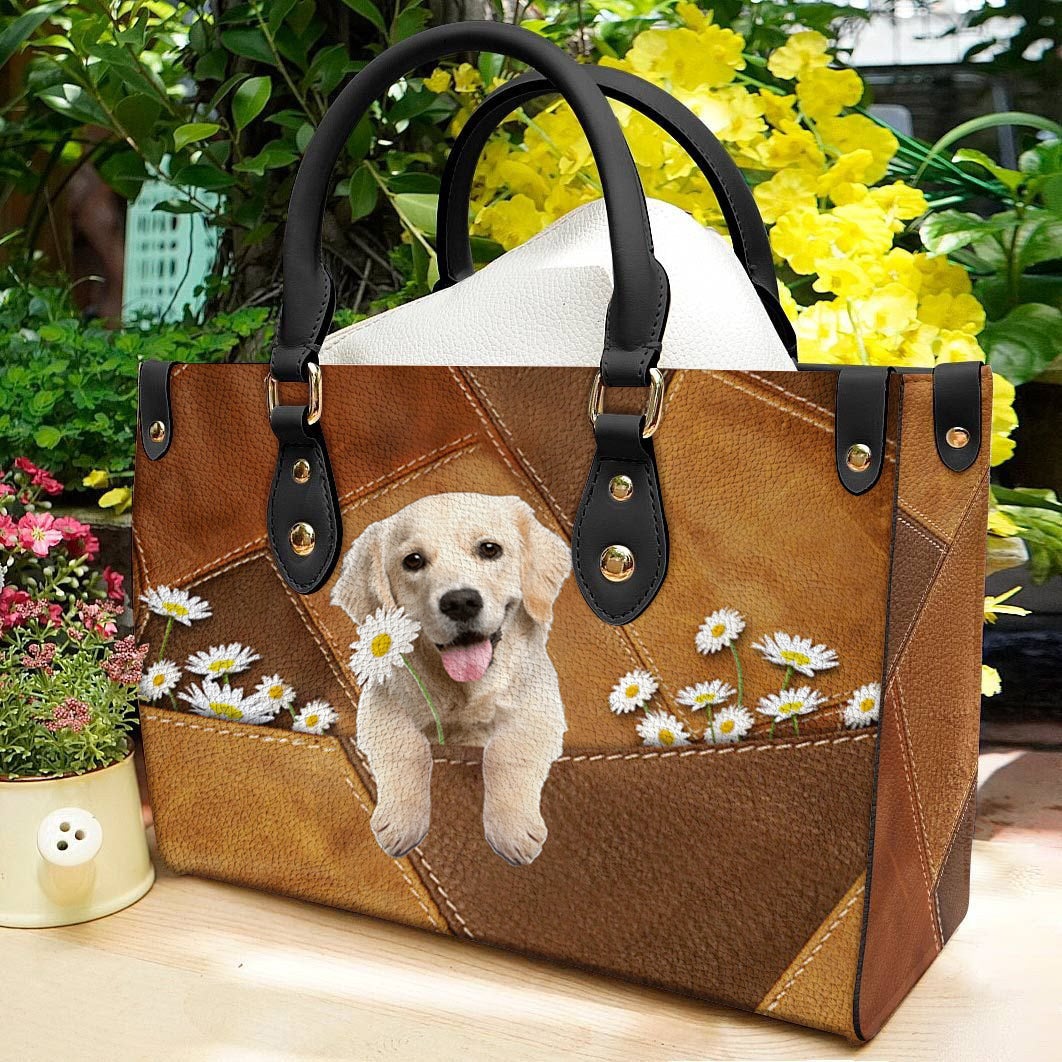 Golden Retriever Holding Daisy Leather Bag