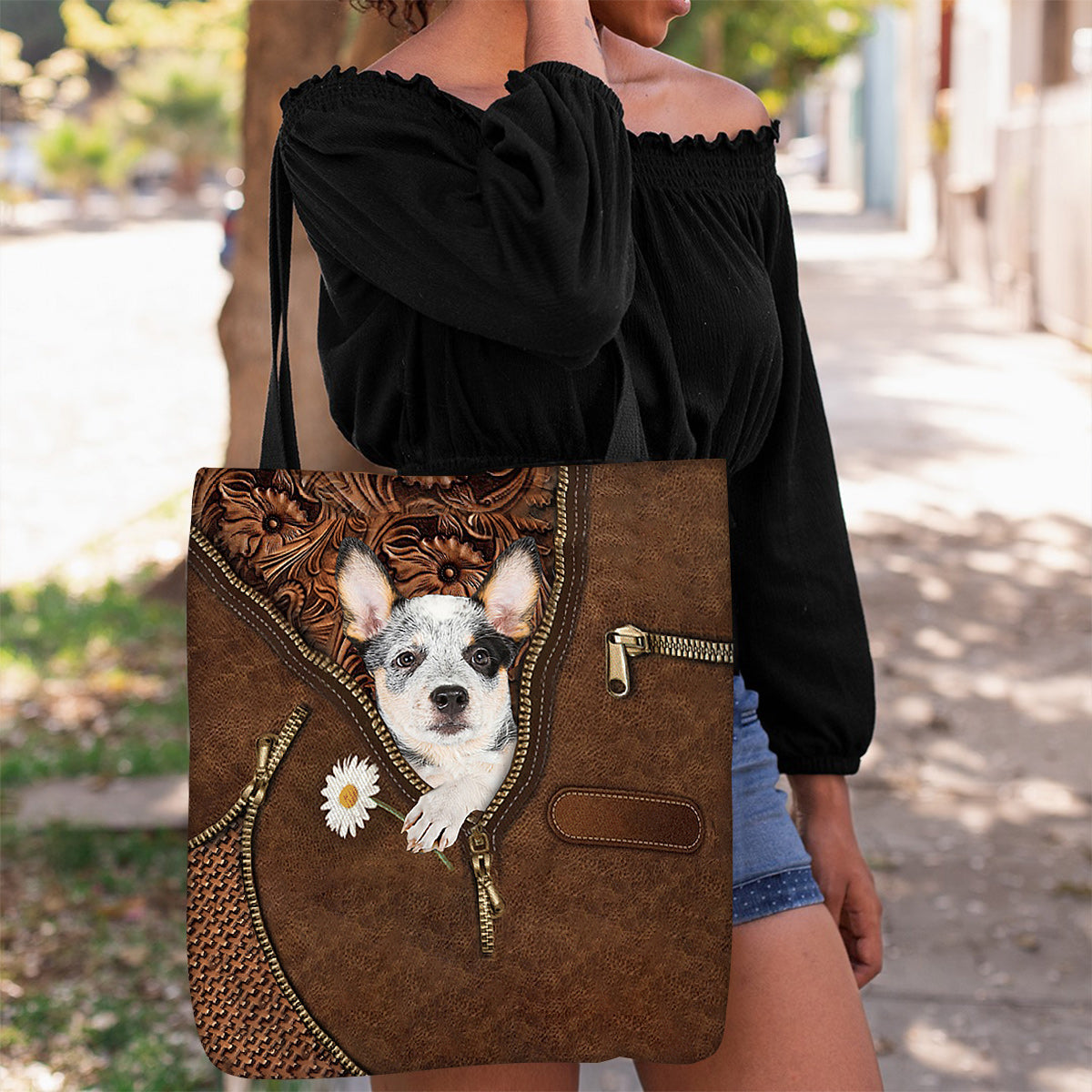 Heeler Holding Daisy Tote Bag
