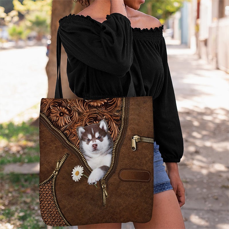 Husky Holding Daisy Tote Bag