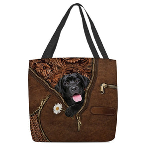 Black Labrador Retriever Holding Daisy Tote Bag