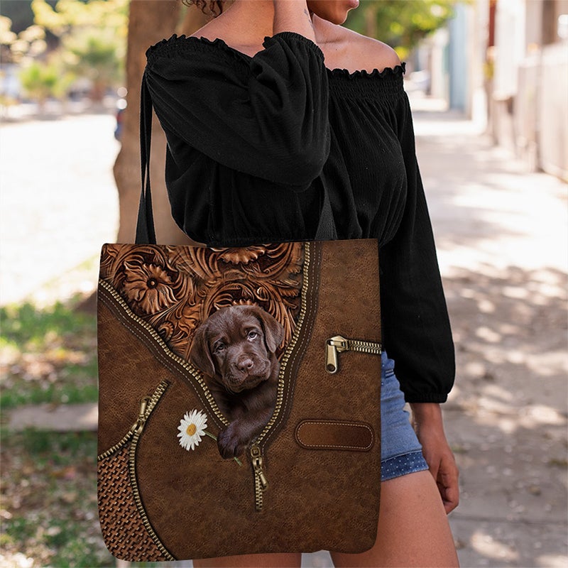 Chocolate Labrador Retriever Holding Daisy Tote Bag