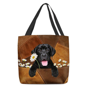 Black Labrador Retriever Holding Daisy  All Over Printed Tote Bag