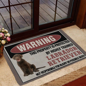 THIS PROPERTY IS PROTECTED BY HIGHLY TRAINED Chocolate Labrador Retriever Doormat