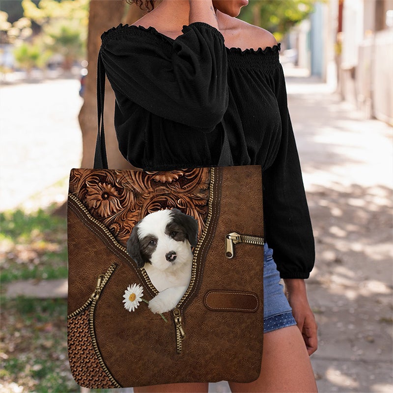 Old English Sheepdog Holding Daisy Tote Bag