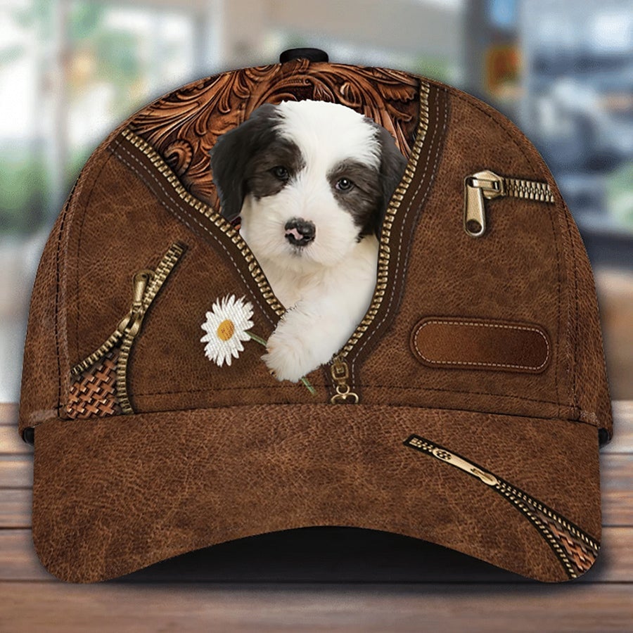 Old English Sheepdog Holding Daisy Unisex Cap