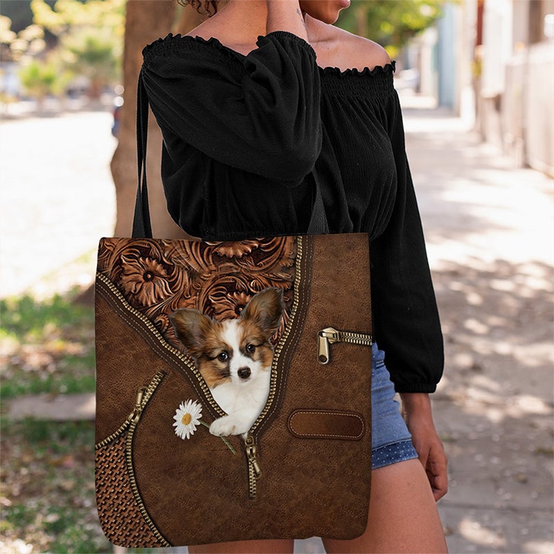 Papillon Holding Daisy Tote Bag