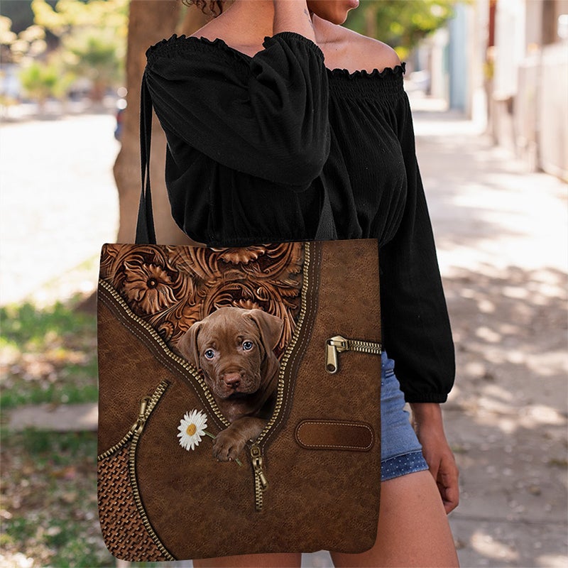 Pitbull Holding Daisy Tote Bag
