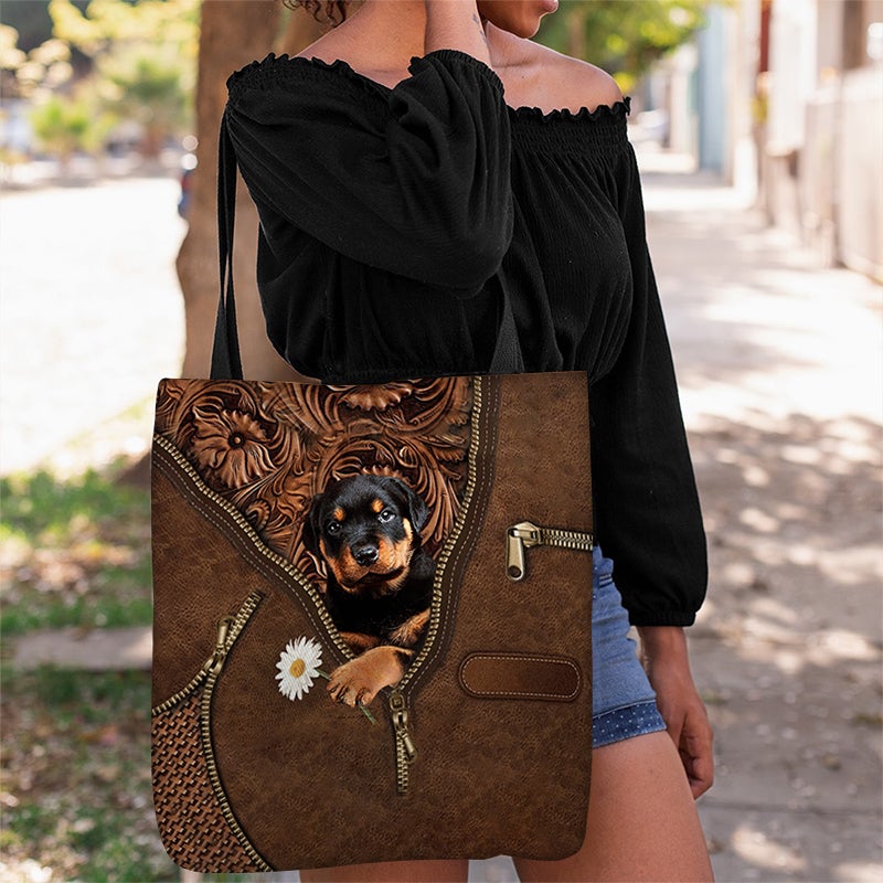 Rottweiler Holding Daisy Tote Bag