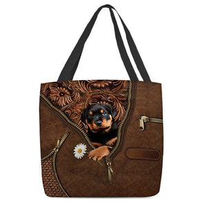 Rottweiler Holding Daisy Tote Bag