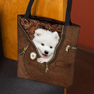 Samoyed Holding Daisy Tote Bag