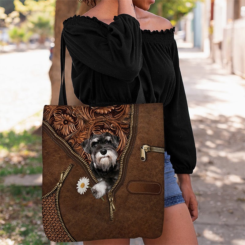 Schnauzer Holding Daisy Tote Bag