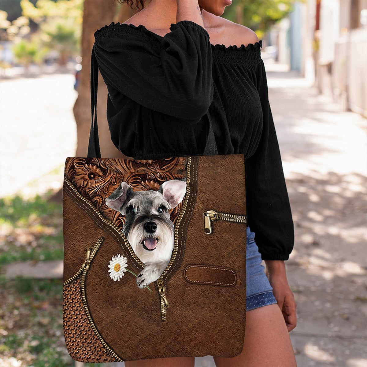 Schnauzer Holding Daisy Tote Bag