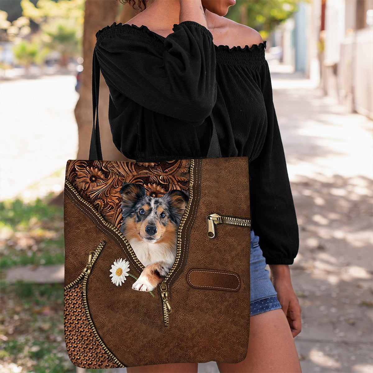 Shetland Sheepdog Holding Daisy Tote Bag