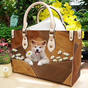 Shiba Inu Holding Daisy Leather Bag