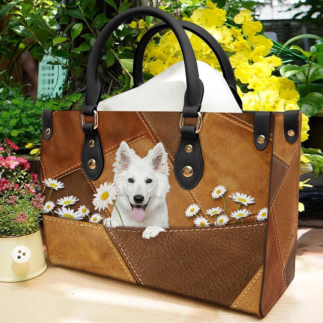 White German Shepherd Holding Daisy Leather Bag