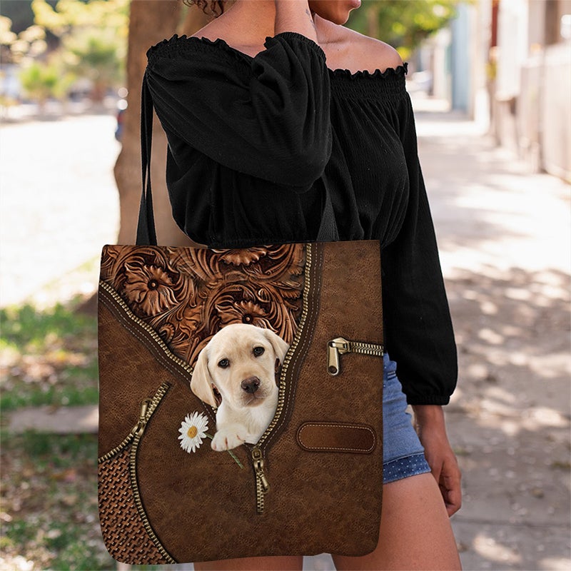 Yellow Labrador Holding Daisy Tote Bag