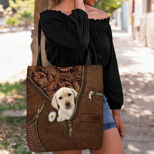 Yellow Labrador Holding Daisy Tote Bag